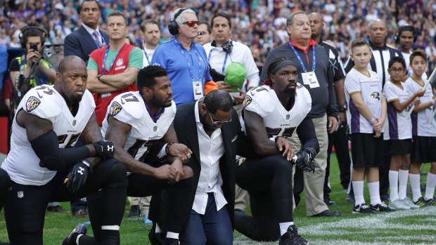 Members of the Baltimore Ravens take a knee on Sunday at Wembley, London.