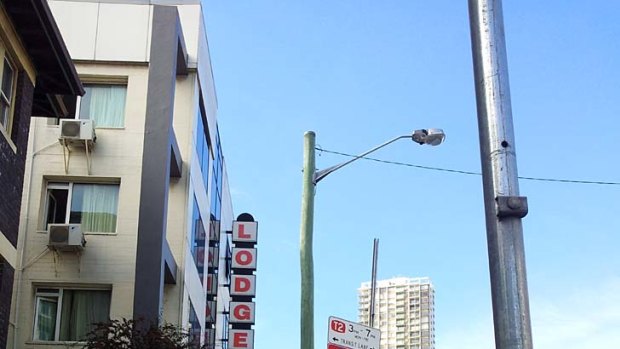 Fatal injuries ... a man was found hurt outside this motel in Edgecliff.