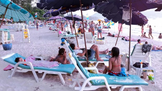 Tourists head to the beaches to avoid the political turmoil in Bangkok.