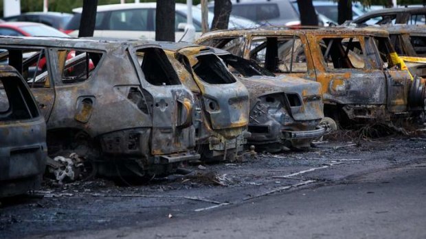 A discarded cigarette may caused the fire which destroyed 43 cars.
