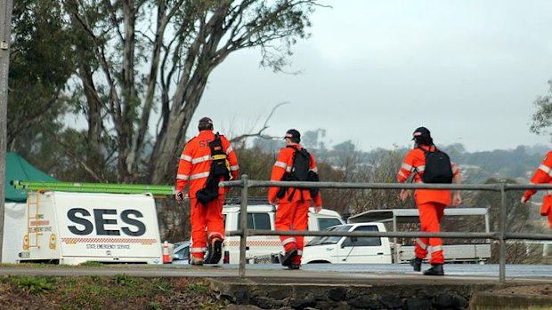 State Emergency Service volunteers search for Gail Lynch.