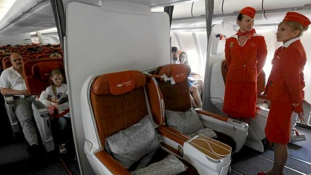 People sit onboard an Aeroflot Airbus A330 at Moscow's Sheremetyevo airport.