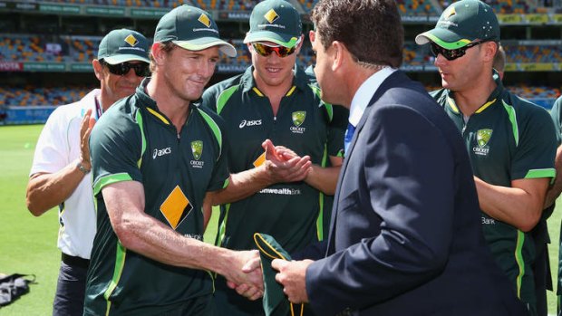 Mark Taylor presents George Bailey with his Test cap.