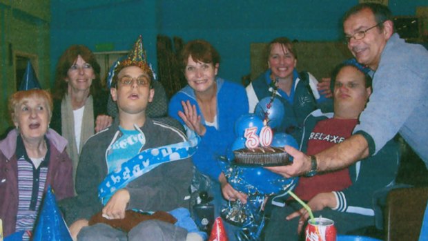 Leigh (left) celebrates his 30th with his mother, Kristina (centre), brother David and father Eddie.