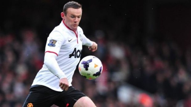 Ready launch: Wayne Rooney gets set to strike for goal.