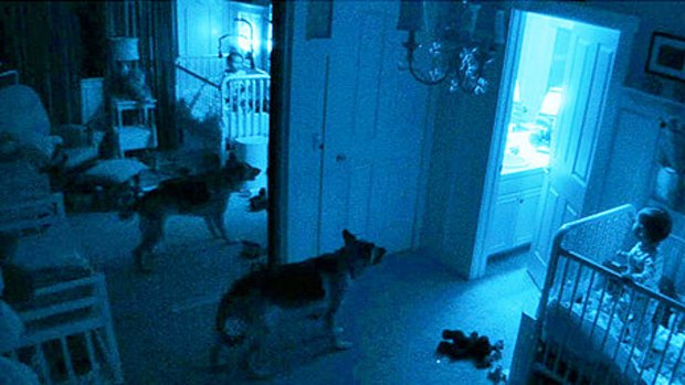 Dog and baby face down the ghosts in the terrible Paranormal Activity 2.