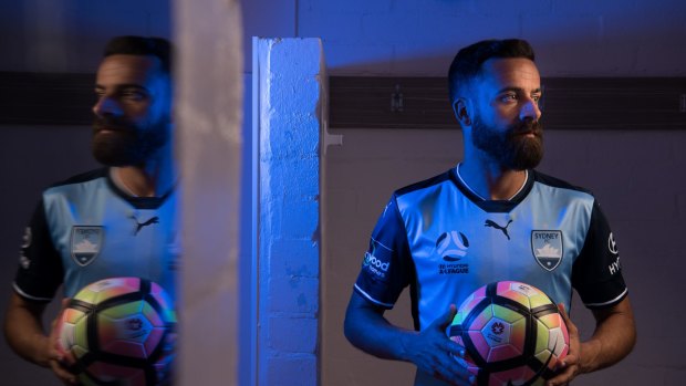 Leading by example: Alex Brosque says Graham Arnold has vowed to set exacting standards for him as skipper.