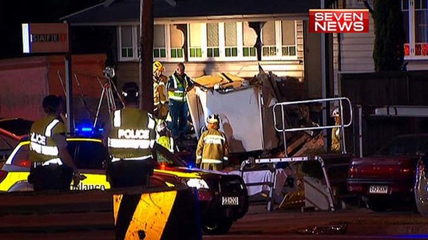 The truck cabin crumpled as it hit the boarding house in Brisbane's south.