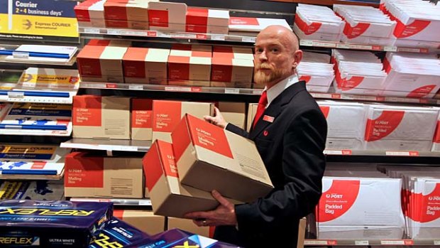 GPO postal manager Peter Ferguson at Martin Place office . . . Australia Post's profit generated a $173 million windfall for the federal government.