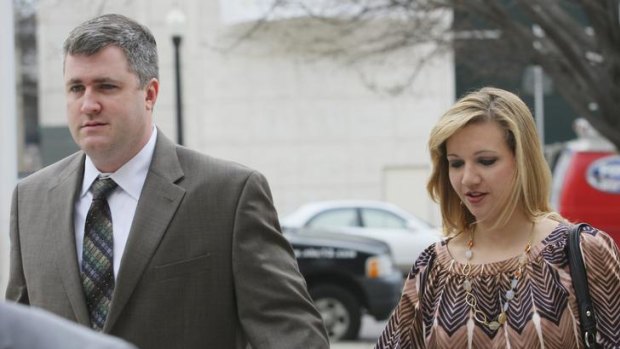 Watson and his wife Kim outside court in Alabama, his home town.