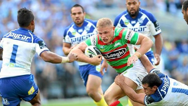 George Burgess charges to the tryline to score the first points for the Rabbitohs.