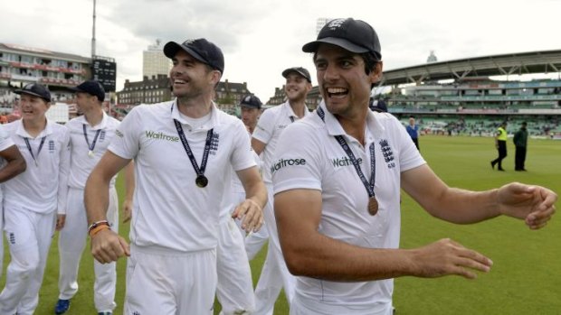 England's Alastair Cook (R) and James Anderson (3rd R) celebrate England defeating India 3-1.