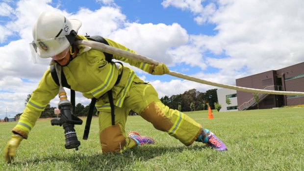 ACT Fire and Rescue firefighter Kari Harlovich tries out the new test at the ACT Emergency Services Agency headquarters at Fairbairn on Thursday.