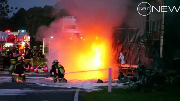 Fiery crash ... one person has died after a car collided with a truck in northern NSW.