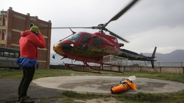 A helicopter transporting the body of Ueli Steck at Teaching Hospital in Kathmandu, Nepal.