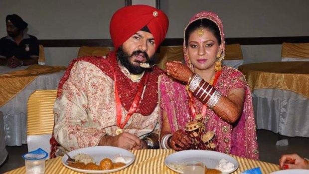 Avjit Singh and his wife Sargun Ragi at their wedding last year.