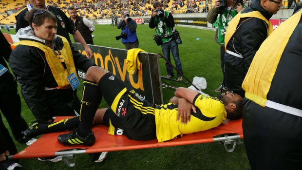In agony: Wellington's Paul Ifill didn't return after leaving the pitch.