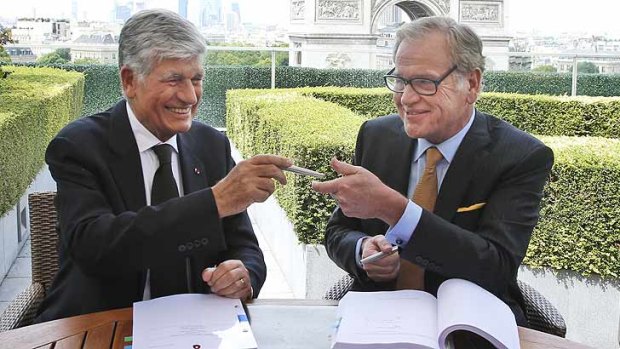 Merger ... Maurice Levy, left, Chief Executive of French advertising group Publicis, and John Wren, head of Omnicom Group.