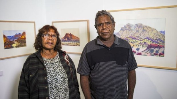 Lenie and Kevin Namatjira with part of the Namatjira to Now exhibtion at Parliament House.