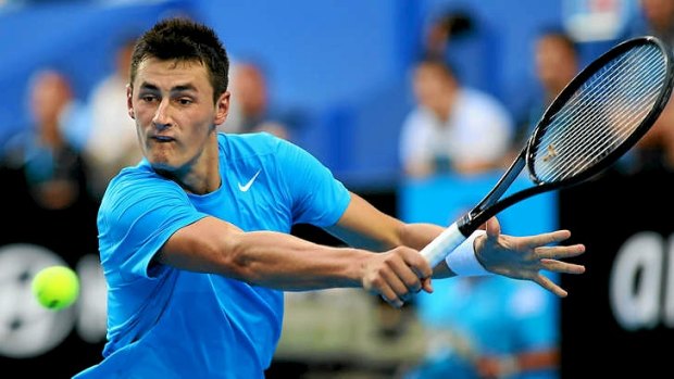 Bernard Tomic will feature at the Sydney International on Tuesday with a heatwave scheduled to hit the city..