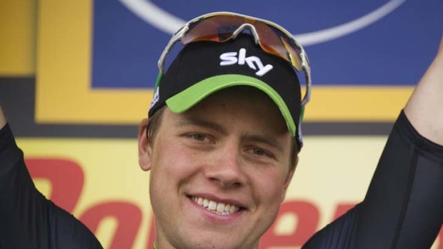 Norway's Edvald Boasson Hagen celebrates on the finish line after winning the 226.5 km sixth stage.
