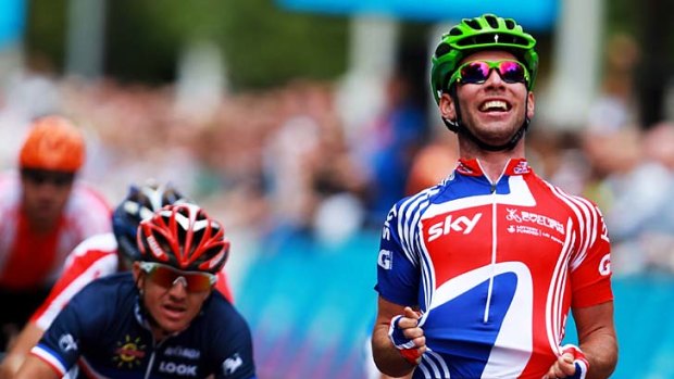 Mark Cavendish celebrates as he wins the Olympic test event on the streets of London last year.