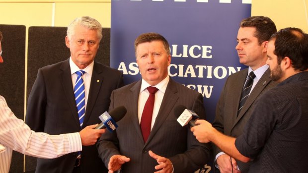 "More and better-resourced police than ever before": Minister for Police MIke Gallacher.