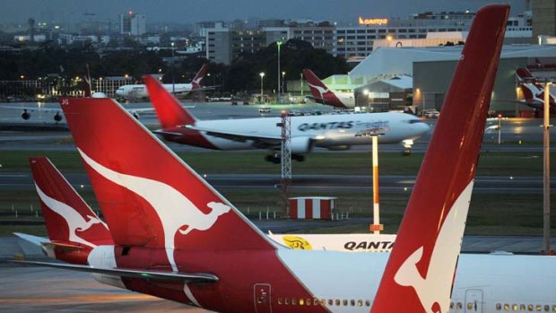Stranded planes in Sydney yesterday.