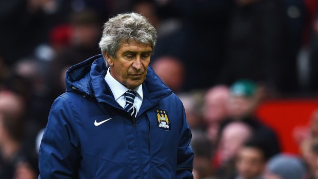 Manuel Pellegrini manager of Manchester City looks despondent after defeat last week.