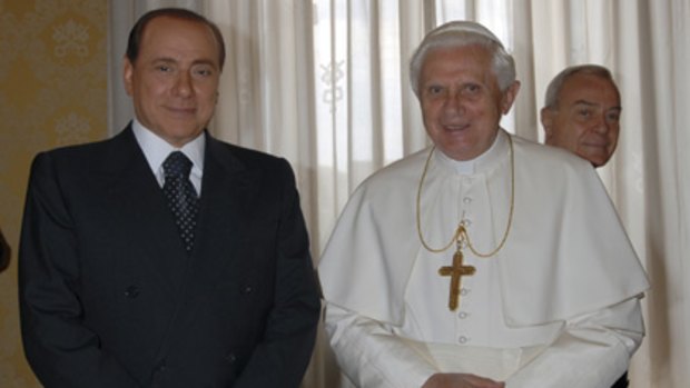 Rift denied... Silvio Berlusconi with the Pope last year.