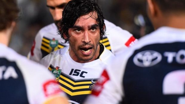 Laying down the law: Johnathan Thurston addresses his players during the finals win over Brisbane.