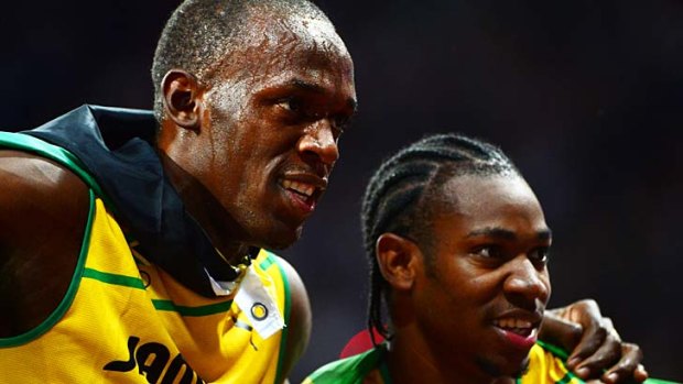 Said they weren't distrcated ... Jamaica's Usain Bolt celebrates with Yohan Blake.