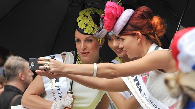 Snappy ... Parade-goers take a selfie in Swanston Street.