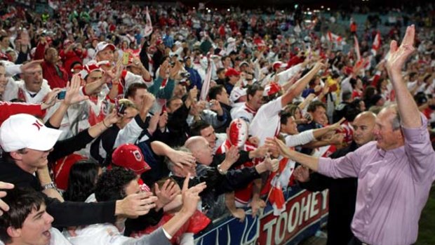 Fan favourite ... St George Illawarra coach Wayne Bennett celebrates his seventh premiership after helping guide the Dragons to a NRL grand final victory against the Roosters in early October.