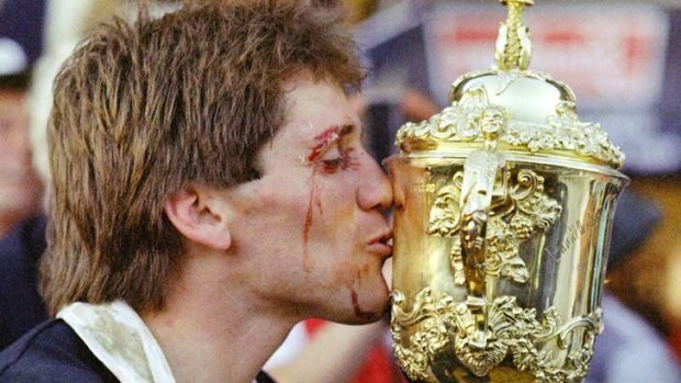 David Kirk kisses the William Webb Ellis trophy after New Zealand's victory in the 1987 Rugby World Cup final over France at Eden Park.