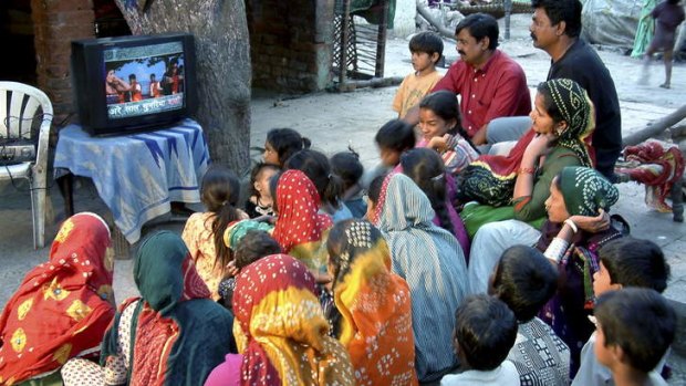 Viallagers in Gujarat watch subtitled Bollywood films.