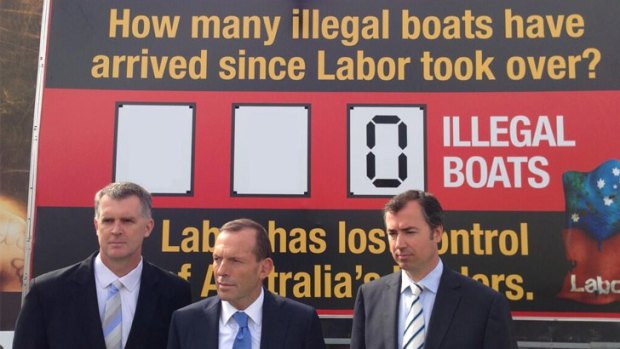 Tony Abbott's illegal boats sign with some adjustments from Twitter user @plmcky.