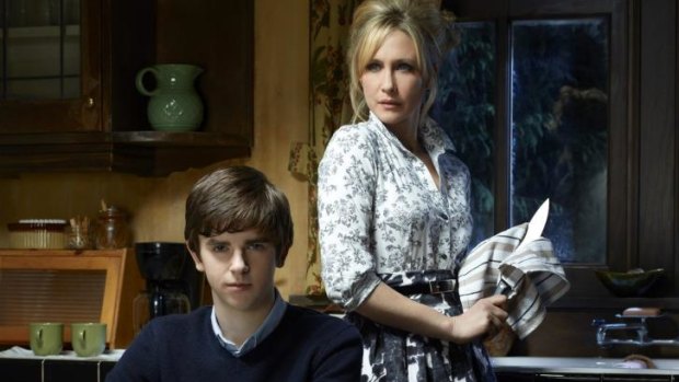 Freddie Highmore steps into Norman Bates' shoes, accompanied by his loving mother, Norma (Vera Farmiga).  