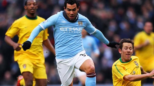 Carlos Tevez of Manchester City came on as a replacement to score the third goal.