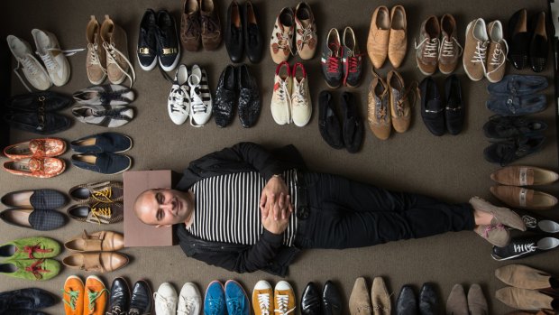 Shoes and more shoes maketh the man. Joe Avati with his designer collection. 