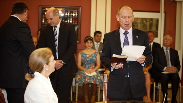 Campbell Newman is sworn into the parliament by Queensland Governor Penelope Wensley.