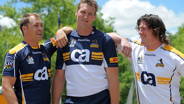 Stephen Hoiles, Justin Harrison and Guy Shepherdson model the new Brumbies jersey.