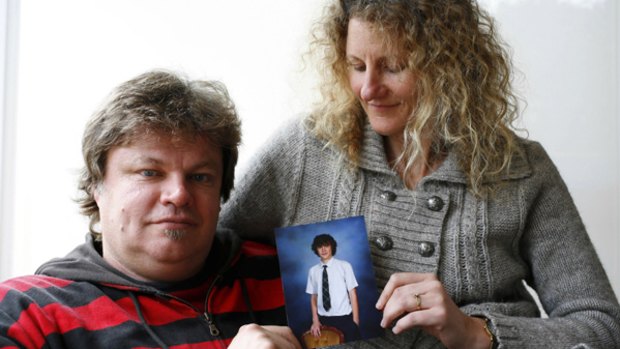 Michael and Jill Lee with a picture of their son Hayden at their East Brighton home.