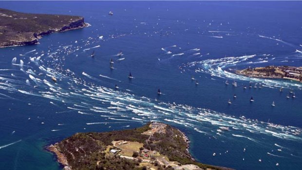Rain affected ... numbers watching the start of the Sydney to Hobart yacht race could be down if the wet weather continues.
