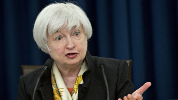 Janet Yellen after the Fed's open market committee meeting on Wednesday. The central bank left the target range for the benchmark federal funds rate unchanged.