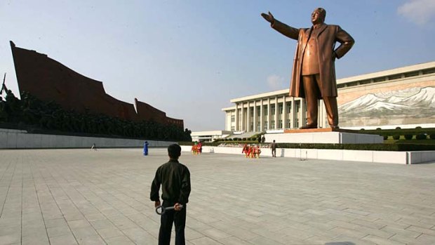 A giant statue of Kim Il Sung stands in central Pyongyang.