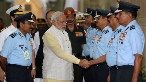 New India: Narendra Modi meets top air force commanders in Delhi. The prime minister has promised sweeping reform of governance in India.