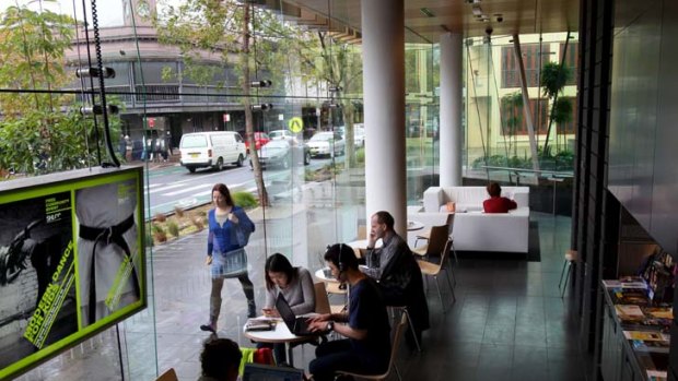 Welcoming ... light and and airy spaces draw a constant flow of patrons to Surry Hills library.