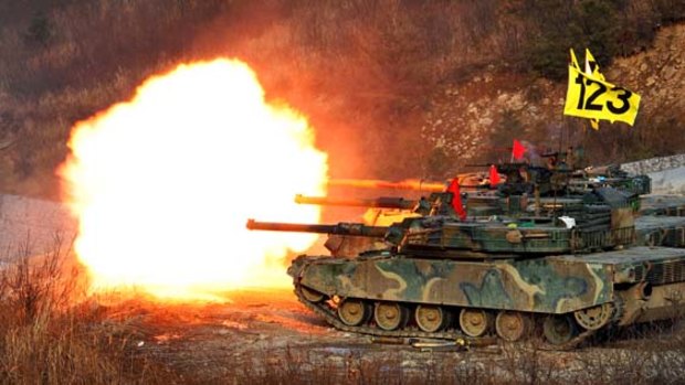 Show of strength .... South Korean Army K-1a tanks fire rounds during air and ground military exercises in Pocheon.
