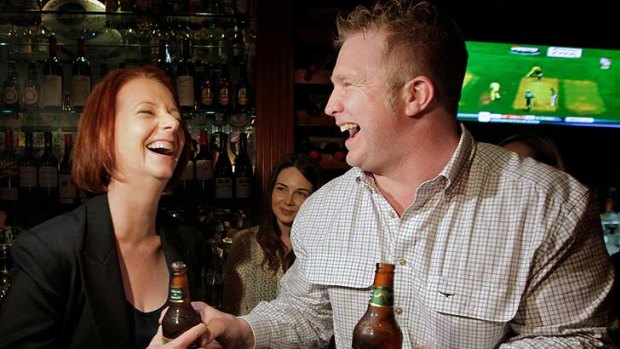 The Australian's publican Matt Astill - sharing a laugh with Julia Gillard in March - says Aussie tourists and locals with "nothing else to do" were propped at the bar.